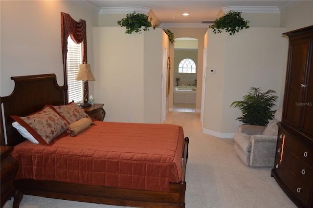 bedroom featuring recessed lighting, light carpet, arched walkways, and crown molding