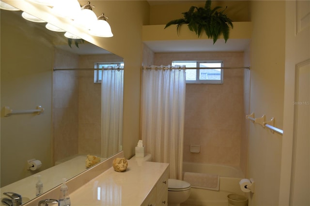 bathroom with shower / bath combination with curtain, toilet, and vanity