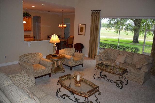living room featuring a notable chandelier, recessed lighting, arched walkways, carpet floors, and crown molding