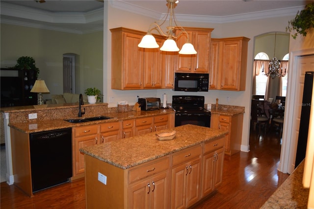 kitchen featuring a sink, arched walkways, black appliances, and a chandelier