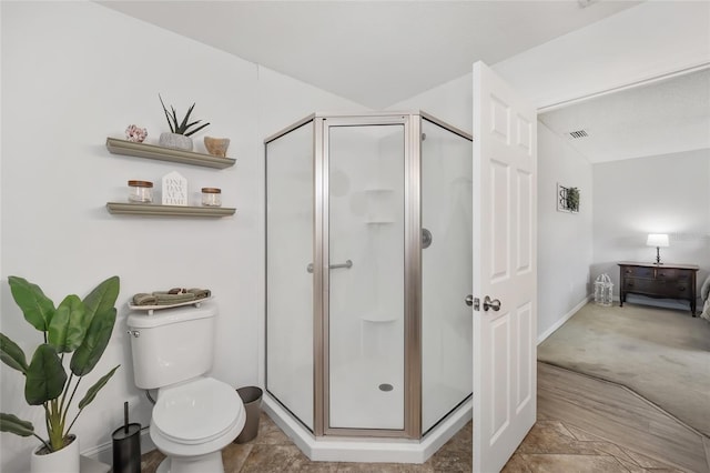 full bath with a stall shower, visible vents, and toilet