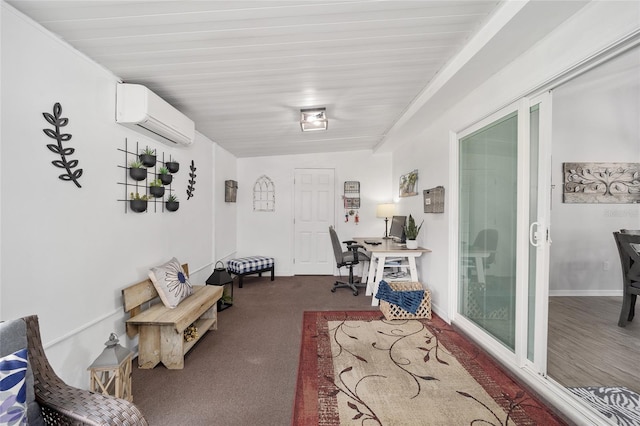 interior space featuring baseboards, carpet flooring, and a wall mounted air conditioner