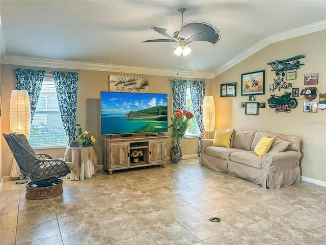 living area with tile patterned flooring, a ceiling fan, baseboards, vaulted ceiling, and ornamental molding