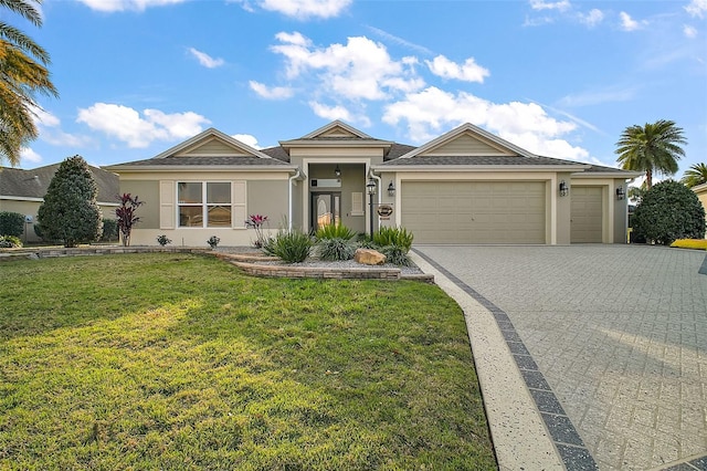 ranch-style home with a garage, a front lawn, decorative driveway, and stucco siding