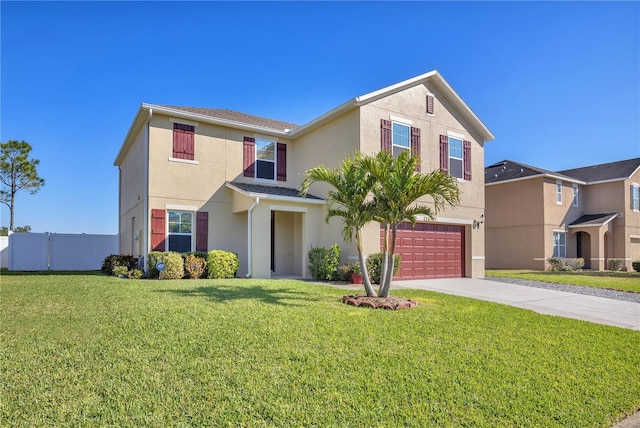 traditional-style home with a front yard, fence, an attached garage, stucco siding, and concrete driveway