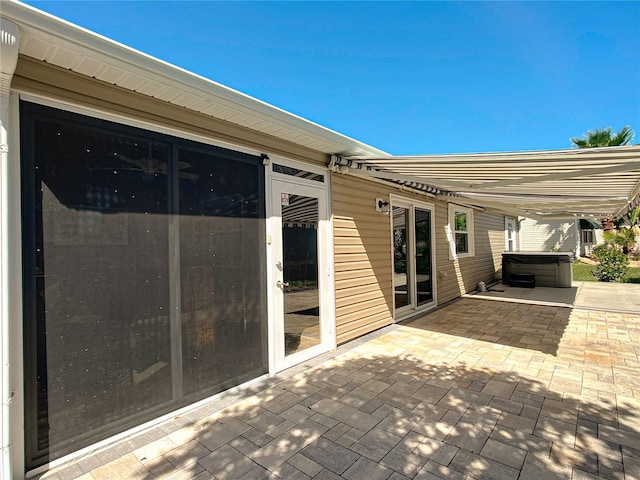 view of patio featuring a hot tub