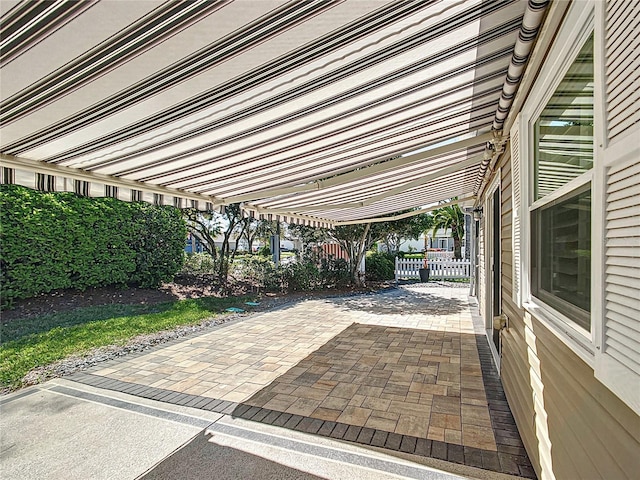 view of patio / terrace featuring fence