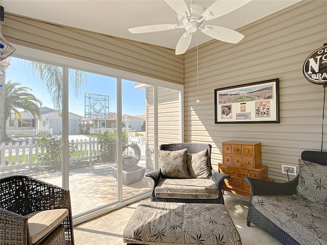 sunroom / solarium with ceiling fan