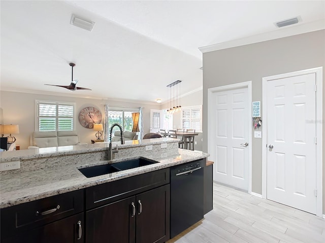 kitchen featuring black dishwasher, visible vents, open floor plan, and a sink