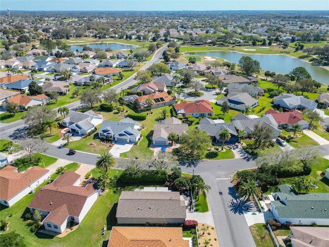 aerial view featuring a residential view and a water view