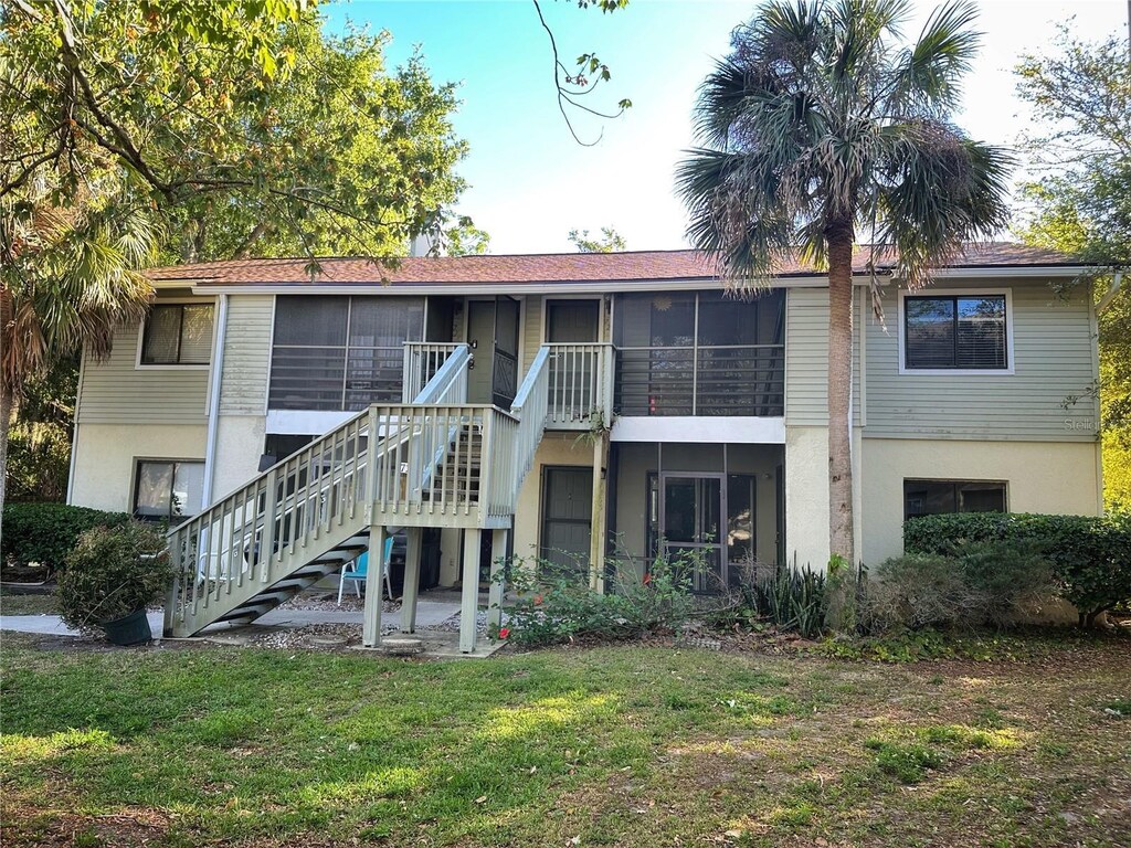 7266 Swallow Run Unit 7266, Winter Park, FL 32792 - view of building exterior with stairs