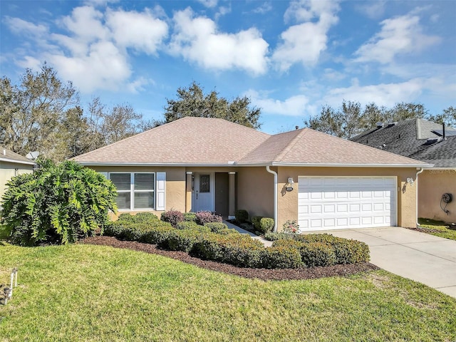 ranch-style home with a shingled roof, concrete driveway, an attached garage, a front yard, and stucco siding