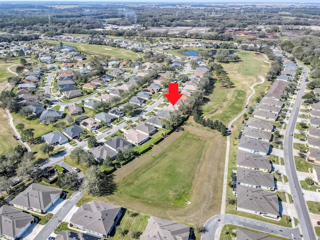 aerial view featuring a residential view and golf course view