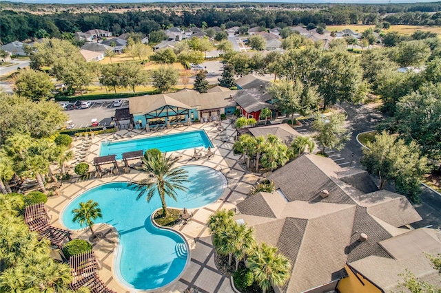 birds eye view of property with a residential view