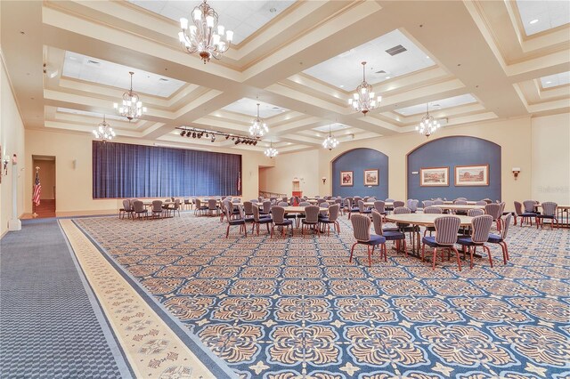 carpeted dining room with an inviting chandelier, coffered ceiling, and crown molding