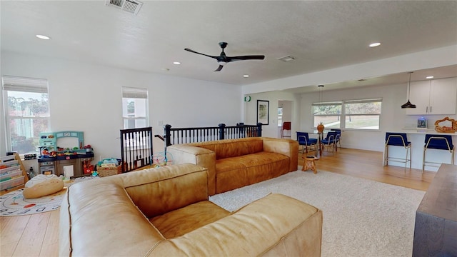 1930 Hilltop Dr, Mount Dora, FL 32757 - living area with visible vents, wood finished floors, and recessed lighting