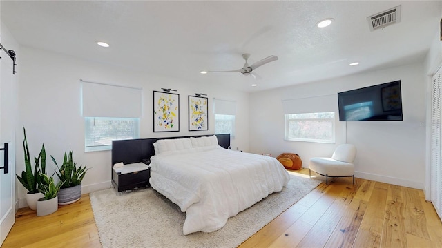 1930 Hilltop Dr, Mount Dora, FL 32757 - bedroom with light wood-type flooring, baseboards, visible vents, and recessed lighting