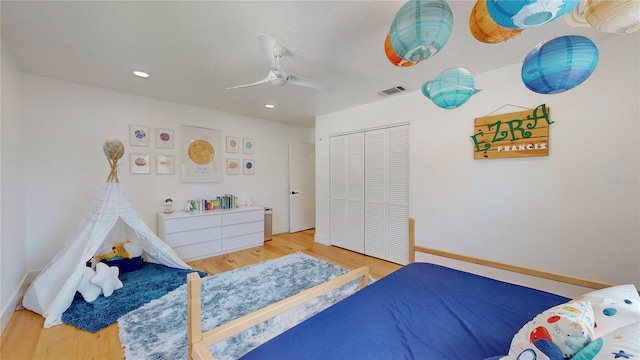 1930 Hilltop Dr, Mount Dora, FL 32757 - bedroom with a closet, wood finished floors, visible vents, and a ceiling fan