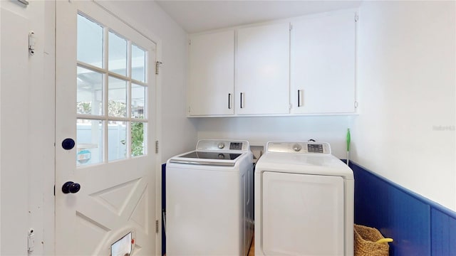 1930 Hilltop Dr, Mount Dora, FL 32757 - laundry room featuring cabinet space and washer and clothes dryer