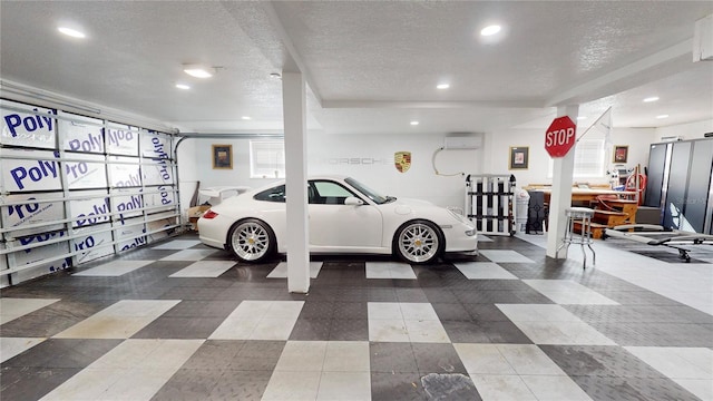 1930 Hilltop Dr, Mount Dora, FL 32757 - garage featuring an AC wall unit and recessed lighting