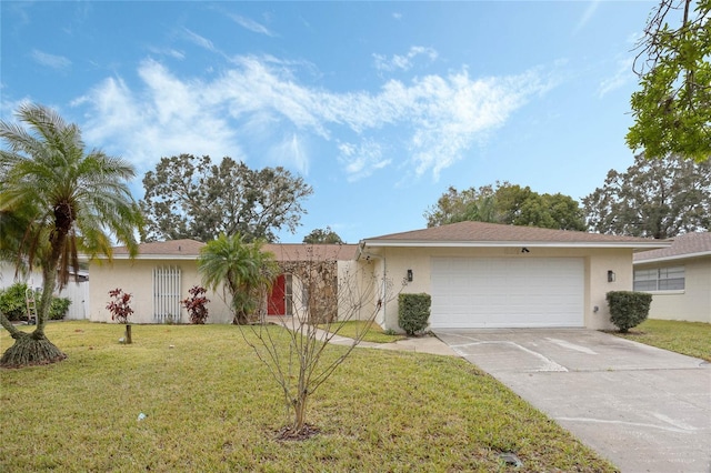 ranch-style house with a garage, driveway, a front lawn, and stucco siding