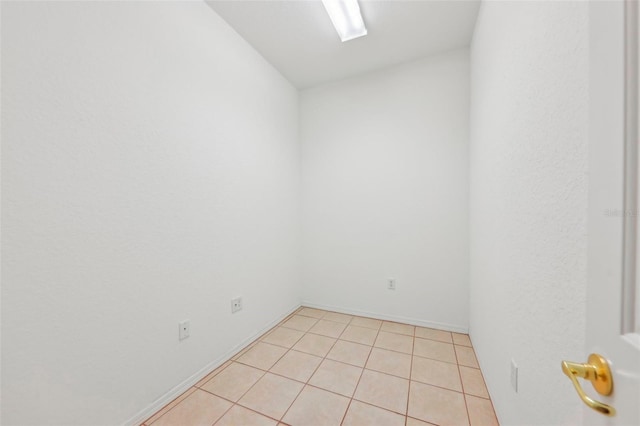 empty room featuring light tile patterned flooring