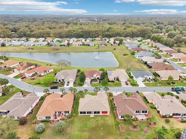 aerial view with a residential view and a water view