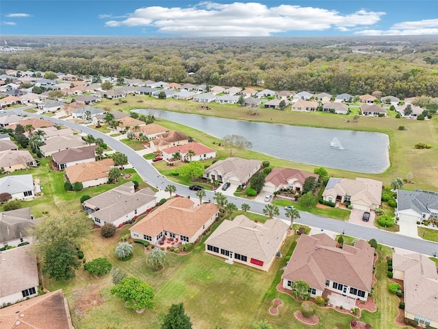 aerial view featuring a water view and a residential view