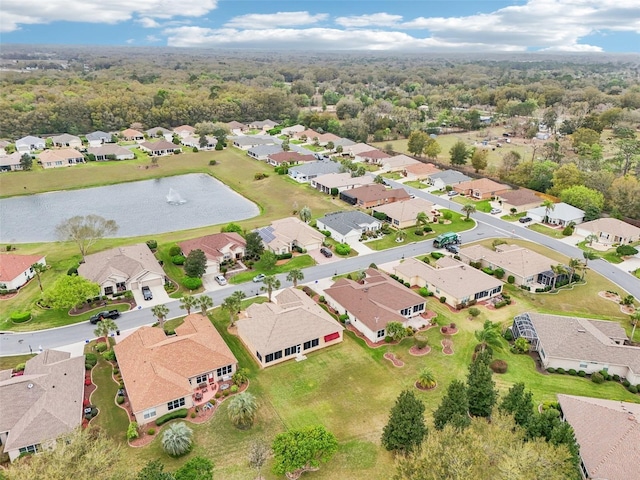 bird's eye view with a water view and a residential view