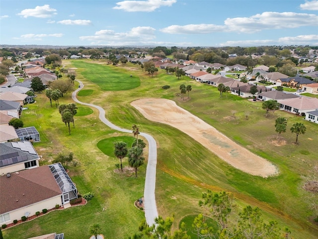 aerial view with view of golf course and a residential view