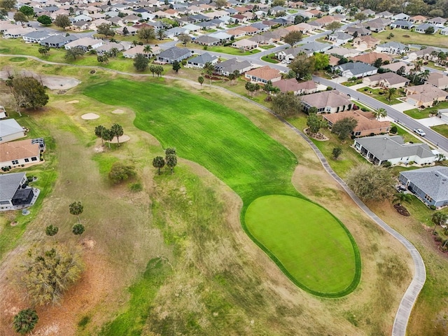 birds eye view of property with a residential view and view of golf course