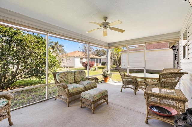 sunroom / solarium with ceiling fan