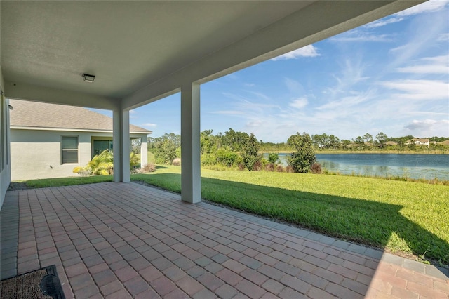 view of patio / terrace with a water view