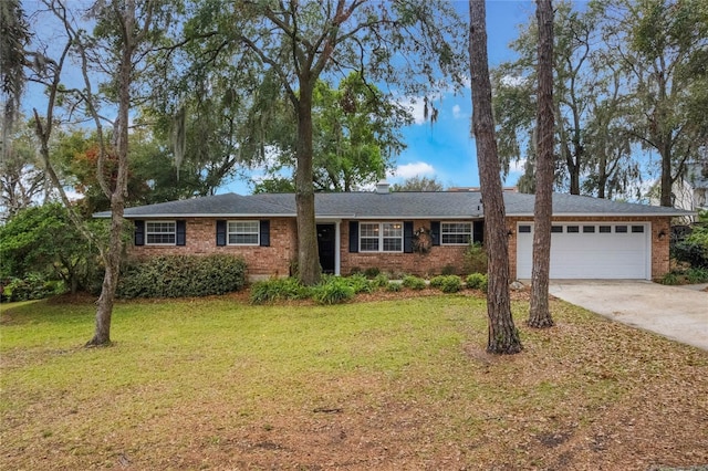 single story home featuring a garage, brick siding, driveway, and a front yard