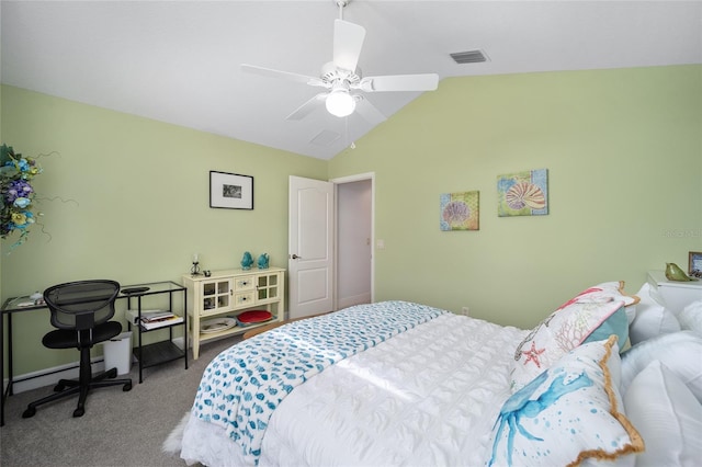 carpeted bedroom featuring vaulted ceiling, a baseboard heating unit, visible vents, and a ceiling fan