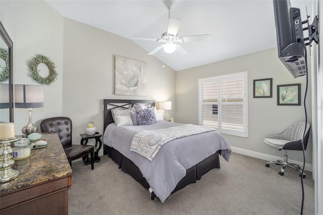 bedroom with lofted ceiling, baseboards, a ceiling fan, and light colored carpet