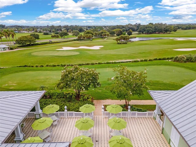 bird's eye view with golf course view and a water view