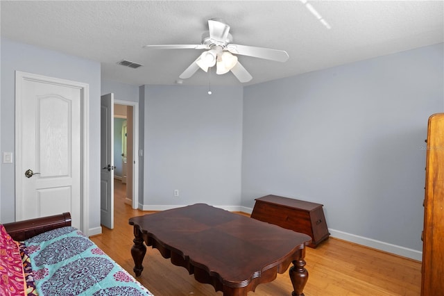 3430 Turningwind Ln, Winter Garden, FL 34787 - bedroom featuring light wood-style flooring, baseboards, and ceiling fan