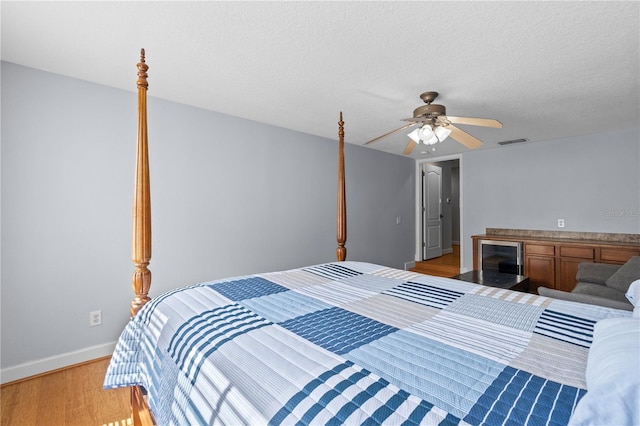 3430 Turningwind Ln, Winter Garden, FL 34787 - bedroom with light wood-style floors, baseboards, and a ceiling fan