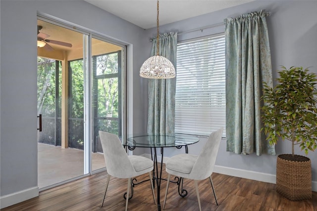 3430 Turningwind Ln, Winter Garden, FL 34787 - dining space with baseboards, wood finished floors, and ceiling fan