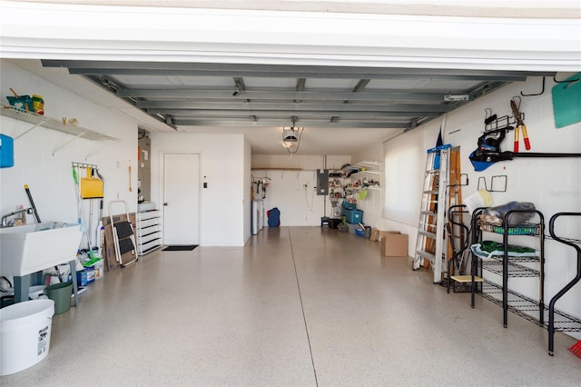 garage with electric panel and a garage door opener