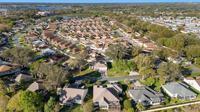 bird's eye view with a residential view and a water view