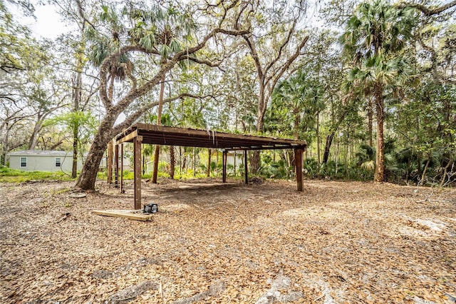 view of yard featuring a carport