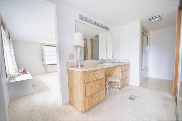 bathroom featuring visible vents and vanity