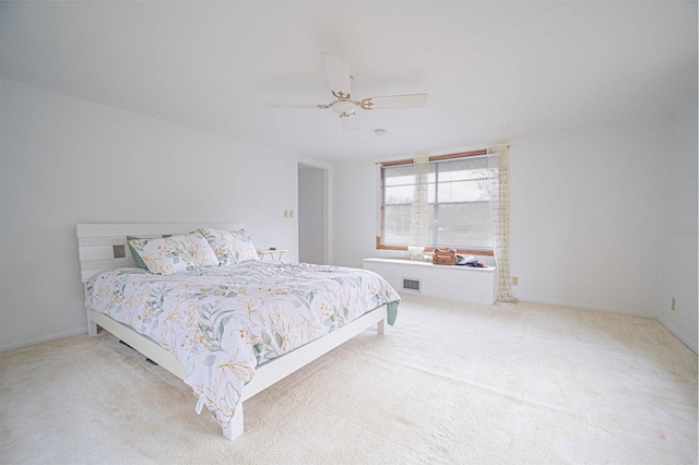 bedroom with visible vents, carpet floors, and ceiling fan