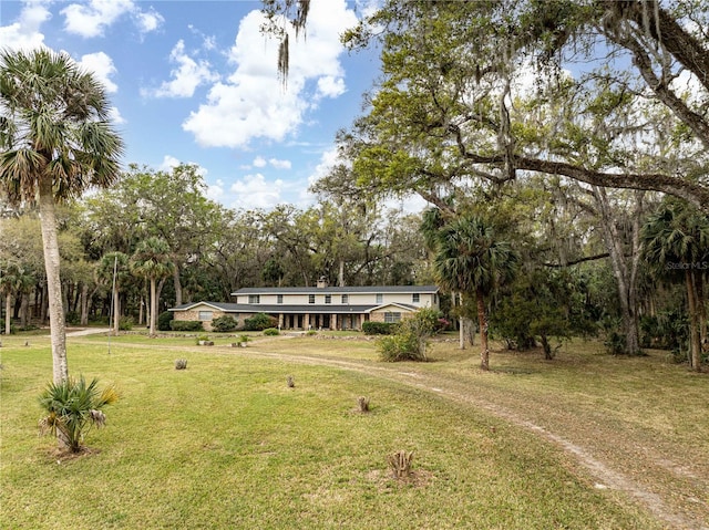 exterior space featuring a front yard