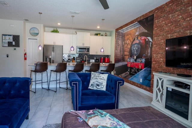 living room featuring visible vents
