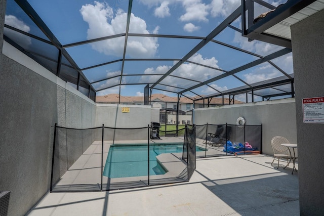 view of pool featuring a fenced in pool, a lanai, and a patio