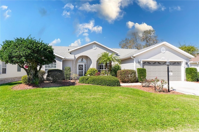 single story home with concrete driveway, a front lawn, and an attached garage