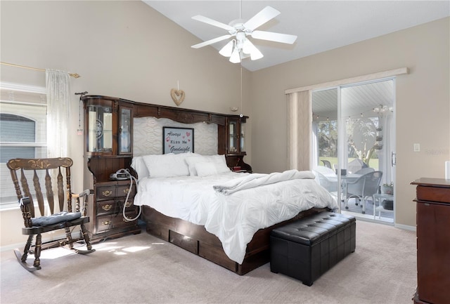 carpeted bedroom featuring access to outside, high vaulted ceiling, a ceiling fan, and baseboards